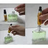 5 pcs / lot 5 ml Refipillable Mini Perfume Bottle Bottom Fumping Perfume Atomizer Box Dispensateur