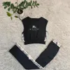 Kvinnors tvåbitar byxor Kvinnas avslappnade ärmlös tank top och byxor sätter dagligen joggingkläder designer svart sportkläder gratis fartyg
