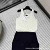 Basic casual jurken Designer merk Xiaoxiang 24p lente/zomer nieuwe dames holle gebreide jacquard vestjurk tonen dezelfde editie South Oil Goods 9f8p