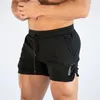 2024 Fitness Sports Shorts Man Летние спортивные залы тренировки мужские дышащие сетчатые шорты Quick Dry Beach Short Pants Men Sportswear 240508