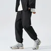 Erkek pantolon bahar gündelik basit harajuku sokak kıyafeti joggers erkek taktik Japon sokak tarzı moda demeti ayakları pantolon