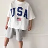 T-Shirts Baby Boys USA Flagge Print Kurzarm Tee Shirt Casual Shorts Jungen Outfit Jungen Kleidung Cotton Girls Kleider Tops Sommer 2024L2405