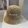 Designer Bucket Hat Luxury Straw Hat Women Lettre du chapeau tissé Luxury M Sunhat Summer Plack Cap Crochet Hat Brand Sun Sun Sun Outdoor Casual Casc