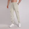 Pantalon de pantalon pour hommes plus taille grande taille xxxl wearwear élastique toit décontracté pantalon extensible pantalon mâle joggeurs noirs masculins