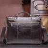 Cas de maltructure en cuir véritable sac à main pour hommes décontractés portables.