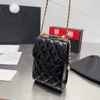 Sac à bandoulière de créateur de cuir de luxe avec crampon en réseau en diamant classique et sac de téléphone à balle dorée new laser mini Fash Woig pour femmes