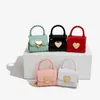 Neue trendige heiße verkaufte Mädchen Handtasche Mini -Tasche Einzelumhängentasche süße Süßigkeiten Farbe Crossbody für Mädchen