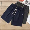Herrbyxor fashionabla urban casual wear sommar japanska arbetskläder stickade shorts med stora fickor sport retro amikaki capris