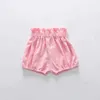 Shorts 2024 Nouveaux vêtements pour bébés pantalons de filles d'été Girls de printemps floger en coton solide pantalon pantalon pain moustique D240510