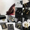 Moda kadın 18k altın kaplama tasarımcı kulak saplama küpe marka tasarımcıları 13 tarzı geometri mektupları kristal küpe düğün partisi jewelr 2353