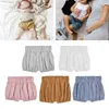 Shorts 2021 Jungen und Mädchen aus Baumwoll Shorts Baby Plissee Blumen Sommershorts für kleine Kinder D240510