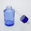 Bouteilles de rangement 100pcs verre 30 ml vide à vendre 30 ml bouteille de compte-gouttes huile essentielle bleue en gros