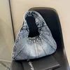 Sacs à bandouliers Sac en denim de style français Jeans de créateur de luxe Femmes 2024 Brands de tissu de grande capacité Brand Femelle Purse