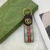 Tasarımcılar Marka Keychain Anahtar Zinciri Erkekler Lüks Araba Knah Derecilik Moda Arı Toka Anahtarları El Yapımı Deri Çantalar Kolye Aksesuarları YB34