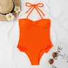 Kvinnors badkläder 2024 vadderad en bit baddräkt sexig ruffle kvinnor push-up bandeau strandkläder baddräkt orange bodysuit monokini