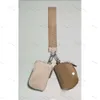 LULULEMO DESIGNER KEYCHAINS Fashion Lu-Metal New Dual Pouch Wristlet Pochette Double Wristlet Strap Waterproof Mini Yoga Bag Löstagbar nyckelkedja 62 870