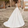 Robes de mariée princesse en satin Scoop Pockets Perles Perles Sash Bride Boutons Country Bridal Robe Vestido de Novia Robe Mariee