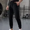 Pantaloni da uomo uomini di alta qualità che gestiscono pellicola di sospensione di allenamento casual outdoor sport a 9 punti pantaloni da allenamento da allenamento bodybuilding