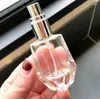 Bouteilles de rangement 10 ml de parfum transparent bouteille de bouteille en vrac 100pcs / lot
