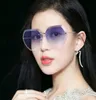 2021New Women039S Solglasögon Ocean Slice Polygonal trimmode Fashion Rimless Metal Ben Big Frame Sun Highquality Whole3178486