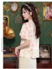 Blans pour femmes en 2024 Blouse d'été en mousseline de mousseline de mode Avancé Tempérament chinois Tops Impression de chemise à manches courtes