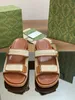 2024 سلسلة الربيع المبكرة Buckle Beach Sandals Slippers الرجال والنساء مع نفس مصمم الأزياء الفاخرة Size35-45
