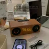 Tabelle Uhrenkonfiguration: Top Wood Bluetooth Lautsprecher FM Radio K1 Wecker Mobiltelefon Wireless Schnellladekarteneinfügungsklang