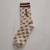 Chaussettes masculines Nouvelles chaussettes enfants enfants sud-coréens ringards colorés de serviette de capuche moyenne lettre inférieure insi tendance chaussettes trmc