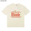 T-shirts de créateurs haut de gamme Rhude pour 2024 Printemps / été New Eagle Letter Imprimer High Cotton T-shirt à manches courtes décontractées pour hommes et femmes avec des étiquettes originales de 1: 1