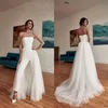 Fashionabla unika enkla plusstorlek jumpsuits bröllopsklänning brudklänningar med löstagbar tåg stropplös ankel längd formell jumpsuit d 276c