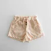 Pantalones cortos de estilo coreano pantalones nuevos pantalones cortos para bebés de verano niños y niñas a cuadrosas descuidadas y transpirables pantalones cortos D240510