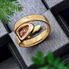 Kvinnors klockor Snake Shape Luxury Wrist Watch for Women Steel Unique Gold Quartz Ladies Clock Relogio Feminino 313C
