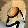 麦わら帽子の広い縁の日焼け止めビーチ黒と白のリボンボウノットキャップカジュアルレディースフラットトップパナマ240511