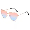 Nouveau métal à la mode Love Ocean Glass Sunglasses Peach Heart Womens Advanced Shaped