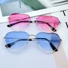 Nouveau métal à la mode Love Ocean Glass Sunglasses Peach Heart Womens Advanced Shaped