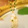 Colliers pendants Tendance Drop chute Lotus Imitation Collier de jade blanc pour le tempérament de cuivre de luxe léger