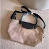 Designer Bag High Quality New 1512 Small Dumpling Bag Womens Nylon Fabric with Cowhide Casual Crossbody Bag Youth One Shoulder Handbag