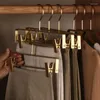 Wieszaki 5PCS Suszone suszenie złota/sliver Metalowe miażdżące spodni spodni do przechowywania aluminium garderoby stojak na ubrania