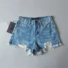 Europe and America's Women's Shorts High Street Projektantka Summer Top Dżinsowe spodenki dla kobiet Czarne dżinsy Kobiety Dostane krótkie krótkie spodenki Małera Raped 9 925