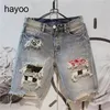 Mens Korean style ripped personalized inner lining washed denim shorts summer stitching five-point jeans 240511