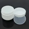 Bouteilles de rangement 5pcs / lot 50 ml Blanc Black Plastique Noir Cosmetic Crème Jar avec un couvercle de traction intérieur transparent Bouteille de voyage vide