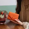 Portafogli designer Womens di lusso piccolo portafoglio corto cardbag borse a tracolla in pelle per la piccola cerniera con cerniera a carnano tasca