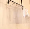 Bolsas de almacenamiento 100 piezas de plástico transparente PVC Niños para niños Polvo Camisa de tapa del polvo Chaqueta traje Bolsa de ropa Protector al por mayor