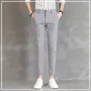 Pantalon masculin 2024 Printemps et été coréen Businet Fashion Casual High Pocket Slim Fit Couleur solide Small Pied