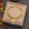 Wholesale Cuban Titanium Steel Gold Non Tarnish Waterproof Seashell Four Leaf Clover Bracelet Women