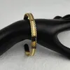 Bracelet ouvert en forme de C en forme de C pour les femmes Hollow Out Lignes Mans en acier inoxydable Bijoux plaqué
