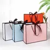 Enveloppe-cadeau 10 pièces / lot de haute qualité et belles sacs-cadeaux roses boîtes de pyjama décoratifs Poirées noires avec rubans papier Cowhide Packagingq240511