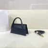 High-end merk enkele schouder Crossbody tas dames handtas portemonnee Franse modeontwerp enkele handgreep Flip Tote Tas Nieuw leer draagbare okselzakje Satchel