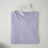 女性ヨガTシャツレディースTシャツ高弾性通気性ランニングトップクイック乾燥シームレスショートスリーブスポーツサイクリングジム良い