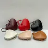 Sacos de forma de designer de alta qualidade Bolsas de moda feminina com uma bolsa de marca de luxo com zíper para presentes do festival 21cm 27149